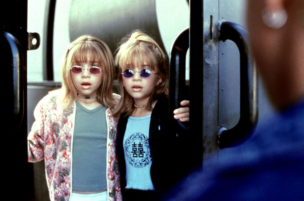 Mary-Kate and Ashley Olsen wearing colour-tinted sunglasses